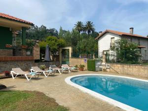 Bazén v ubytování Green House nebo v jeho okolí