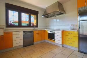 Kuchyň nebo kuchyňský kout v ubytování Green House + 25 fotografií