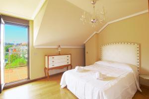 Postel nebo postele na pokoji v ubytování Bajada al Puerto