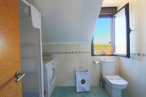 Koupelna v ubytování Bajada al Puerto + 12 fotografií