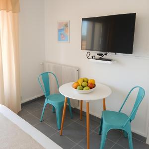 TV a/nebo společenská místnost v ubytování Idéal Pros 4 personnes wifi rapide et parking facile