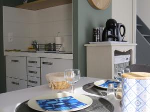 Kuchyň nebo kuchyňský kout v ubytování Le Castel Home Nîmes