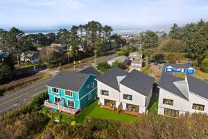 an aerial view of a house on a hill at Lake & Laughter Unit 1 in Rockaway Beach