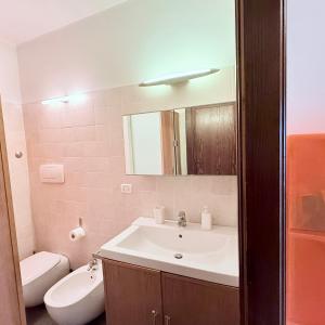 Koupelna v ubytování Baita Arancio By DomusExtra