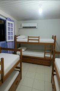 Postel nebo postele na pokoji v ubytování ꕥ Cantinho da Margarida ꕥ Hospedagem & Hostel Premium - 03 Opções - SUÍTE Privativa, CAMAS Hostel ou Meia CASA - 1 Km do CENTRO de Belém, Hangar, UFPA, Turismo e Eventos - Máximo CONFORTO com Wi-Fi Ultra Rápido e Café da Manhã Grátis! - HOTEL Belém Pará