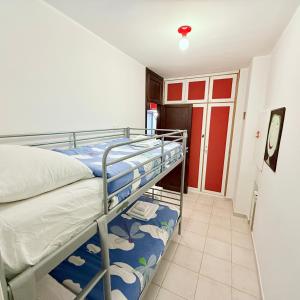 Postel nebo postele na pokoji v ubytování Baita Arancio By DomusExtra