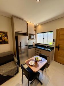 Køkken eller tekøkken på Prox ao Shopping novo e funcional