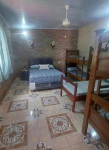 A bed or beds in a room at Quinta Vista Allegra