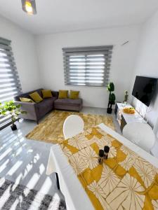 Posezení v ubytování Lapta Residence