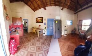 an aerial view of a kitchen with a refrigerator at Villa Celeste in Páramo