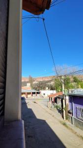a view of an empty street from a building at Humadepto in Humahuaca