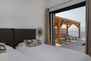 Postel nebo postele na pokoji v ubytování Résidence La Plage