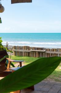 a view of the ocean from a patio at Casa Paracatoá - Icapuí in Icapuí