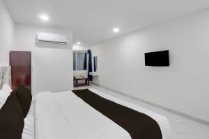 Μια τηλεόραση ή/και κέντρο ψυχαγωγίας στο Hotel O Bluemoon