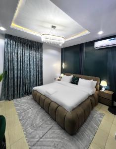 Postel nebo postele na pokoji v ubytování Pat Luxury Apartments
