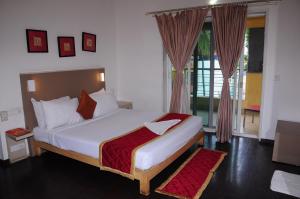 Ένα ή περισσότερα κρεβάτια σε δωμάτιο στο AMC COMFORTS Brigdgestay