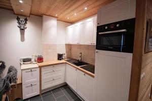 Kuchyň nebo kuchyňský kout v ubytování Portillo 205