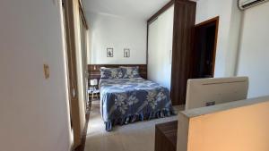 Postel nebo postele na pokoji v ubytování Apartamento duplex em Itaipava com vaga + 24 fotografií