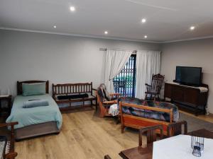 Ένα ή περισσότερα κρεβάτια σε δωμάτιο στο Kardoesie