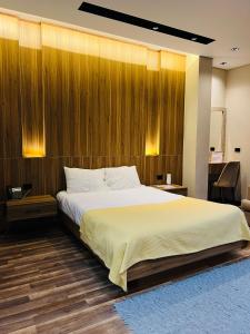 Ένα ή περισσότερα κρεβάτια σε δωμάτιο στο Farida Grand Hotel