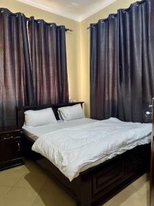 Postel nebo postele na pokoji v ubytování Watra Apartments