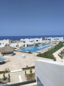 a view of the pool at a resort at 3 bedrooms villa with own pool! in Pano Dheftera