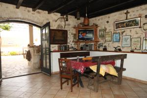 a dining room with a table and a room with a door at Apartments with parking space Ivan Dolac, Hvar - 8753 in Ivan Dolac