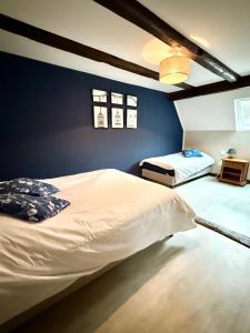 Postel nebo postele na pokoji v ubytování Chez Mamema, maison Alsacienne route des vins + 43 fotografií