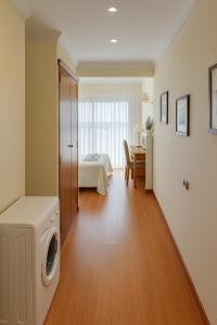 Ένα ή περισσότερα κρεβάτια σε δωμάτιο στο TatyHouse