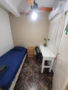 Ένα ή περισσότερα κρεβάτια σε δωμάτιο στο Como en casa Hostel