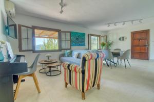 a living room with a couch and a table at Best Views in Valldemossa in Valldemossa