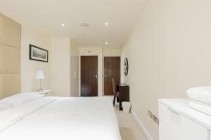 Ένα ή περισσότερα κρεβάτια σε δωμάτιο στο Hestia Travel Colindale +2 φωτογραφίες