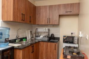 Nhà bếp/bếp nhỏ tại JAS Stays