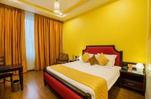 Postel nebo postele na pokoji v ubytování Hotel Kapish Smart-All Pure Veg