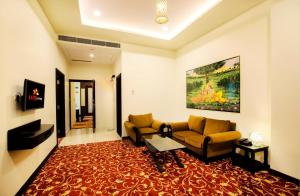 TV a/nebo společenská místnost v ubytování Hotel Kapish Smart-All Pure Veg