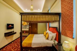 TV a/nebo společenská místnost v ubytování Hotel Kapish Smart-All Pure Veg