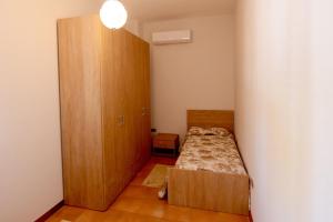 Postel nebo postele na pokoji v ubytování B&B Resort Tina