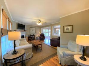 a living room with a couch and a table at Gone Fishin' in Edisto Island