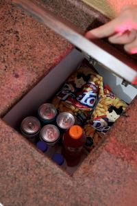 a drawer filled with different types of food and drinks at New Auto Motel in Barcelona +4 photos