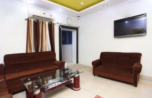 Μια τηλεόραση ή/και κέντρο ψυχαγωγίας στο Hotel O New Mega Palace