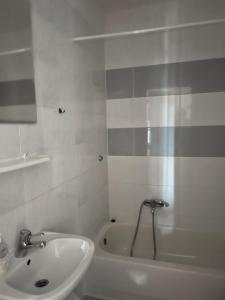 Koupelna v ubytování DW Belmara - Plaża Zachodnia - Ścieżka R10 + 20 fotografií