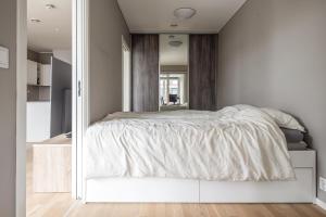 Ένα ή περισσότερα κρεβάτια σε δωμάτιο στο High-end apartment in Trondheim