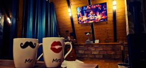 Příslušenství pro přípravu čaje a kávy v ubytování A-frame Love Nest