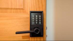 a remote control sticking out of a door at Thurston House Inn in Ocracoke