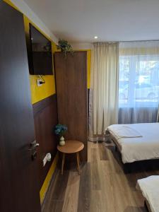 Postel nebo postele na pokoji v ubytování Apartament LaPassione Tecuci