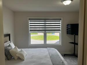 Ένα ή περισσότερα κρεβάτια σε δωμάτιο στο Private bedroom with full bathroom