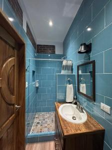 Ένα μπάνιο στο Apartamentos Casa Marco Polo