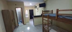 Ένα ή περισσότερα κρεβάτια σε δωμάτιο στο San Cosme Alojamiento