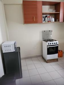 Køkken eller tekøkken på Zariah Homes 2