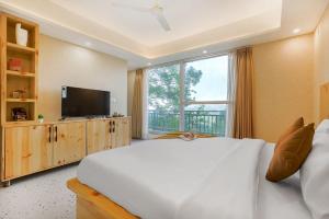 Μια τηλεόραση ή/και κέντρο ψυχαγωγίας στο The Aura Kasauli